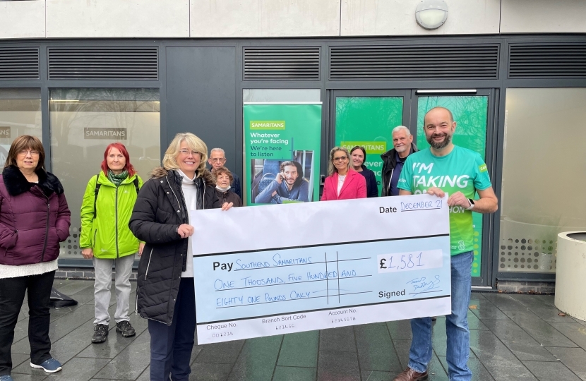 Anna and James present cheque to Southend Samaritans 