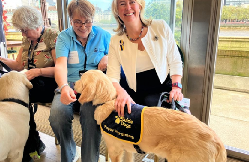 Anna with a guide dog