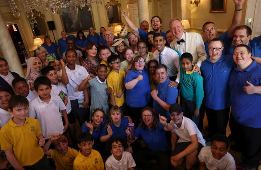 Anna Firth MP for Southend West pictured with the musical group, The Music Man and founder David Stanley