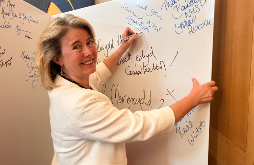 Anna Firth signs Parliament’s Birthday Card to the NHS