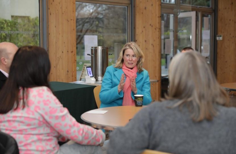 Anna talking to group of constituents 