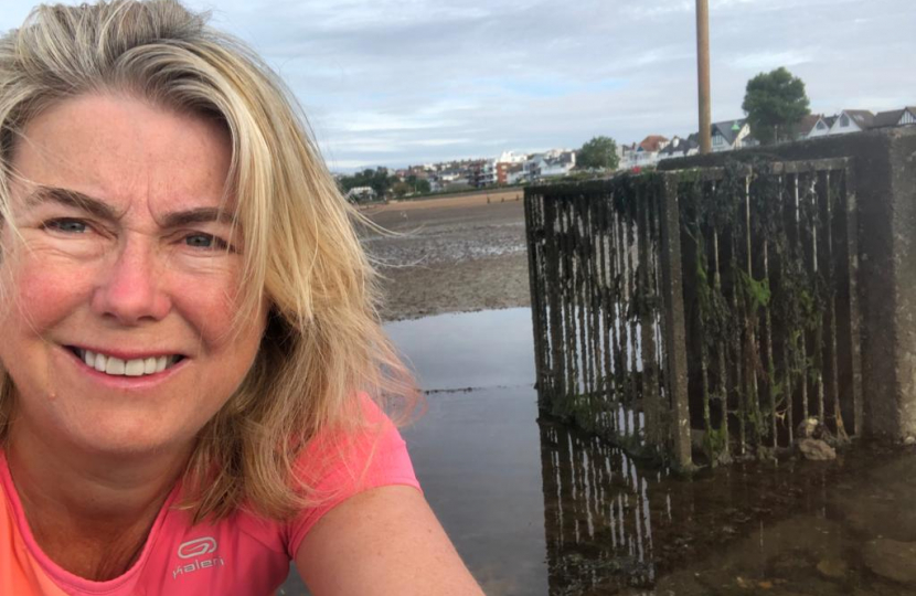 Anna Firth next to a storm overflow in Southend West