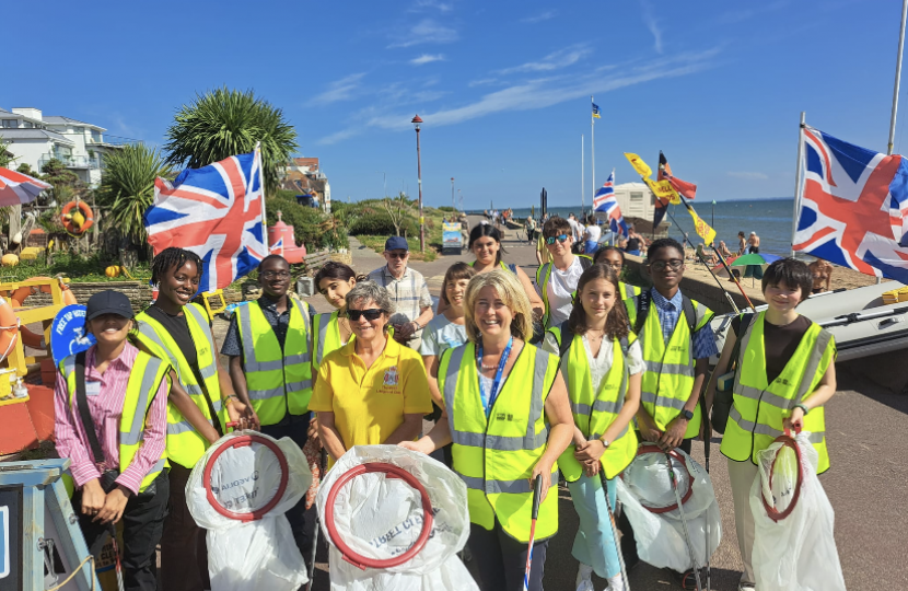 Anna Firth doing beach clean up with work experience students