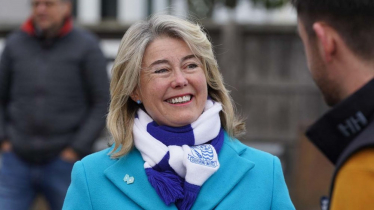 Anna wearing a Southend United scarf