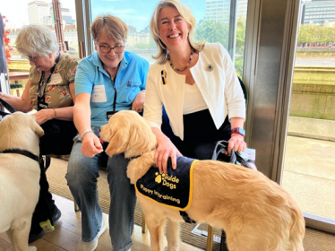 Anna with a guide dog