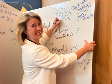 Anna Firth signs Parliament’s Birthday Card to the NHS