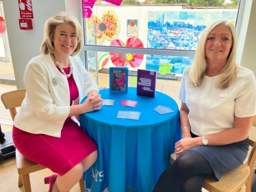 Anna meeting a representative working at the Barclays station in Leigh